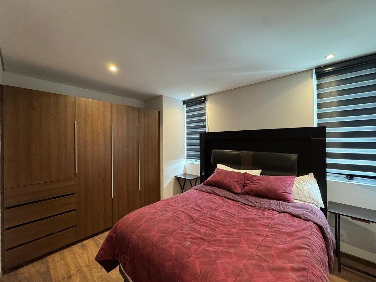 7 de 18: Recámara secundaria con baño