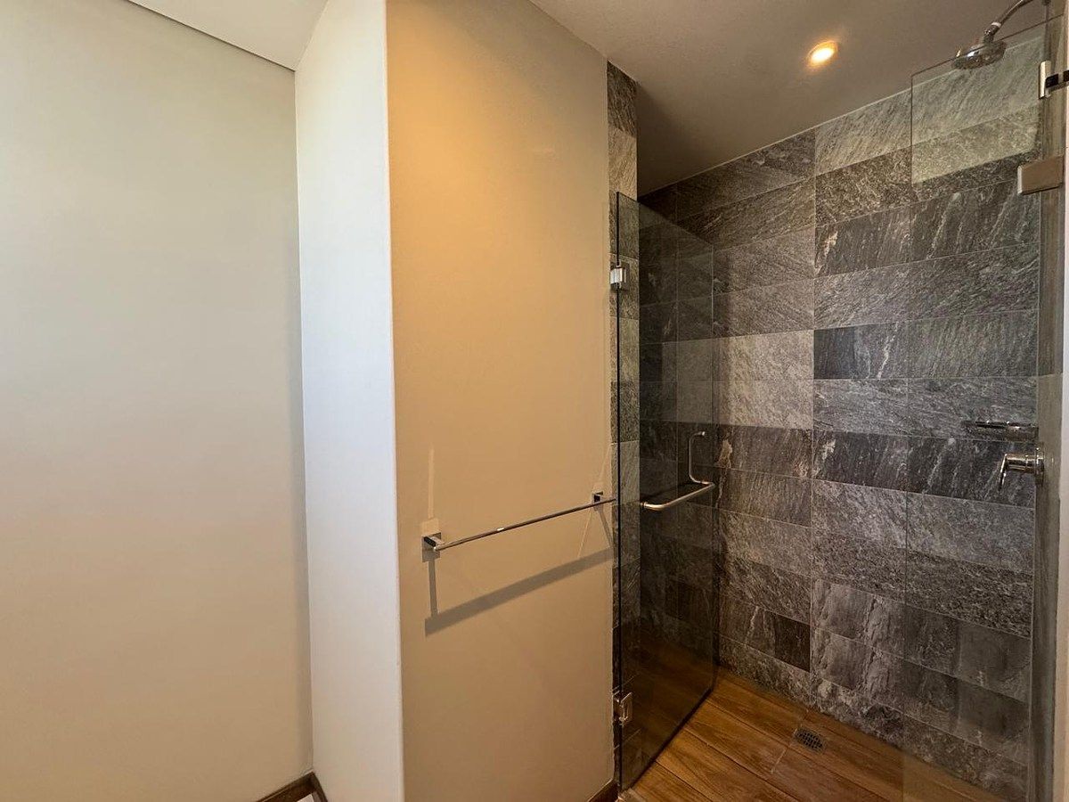 10 de 18: Baño compartido