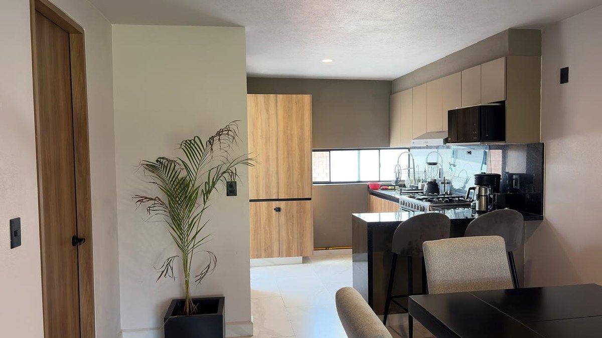 7 de 34: medio baño y acceso cocina