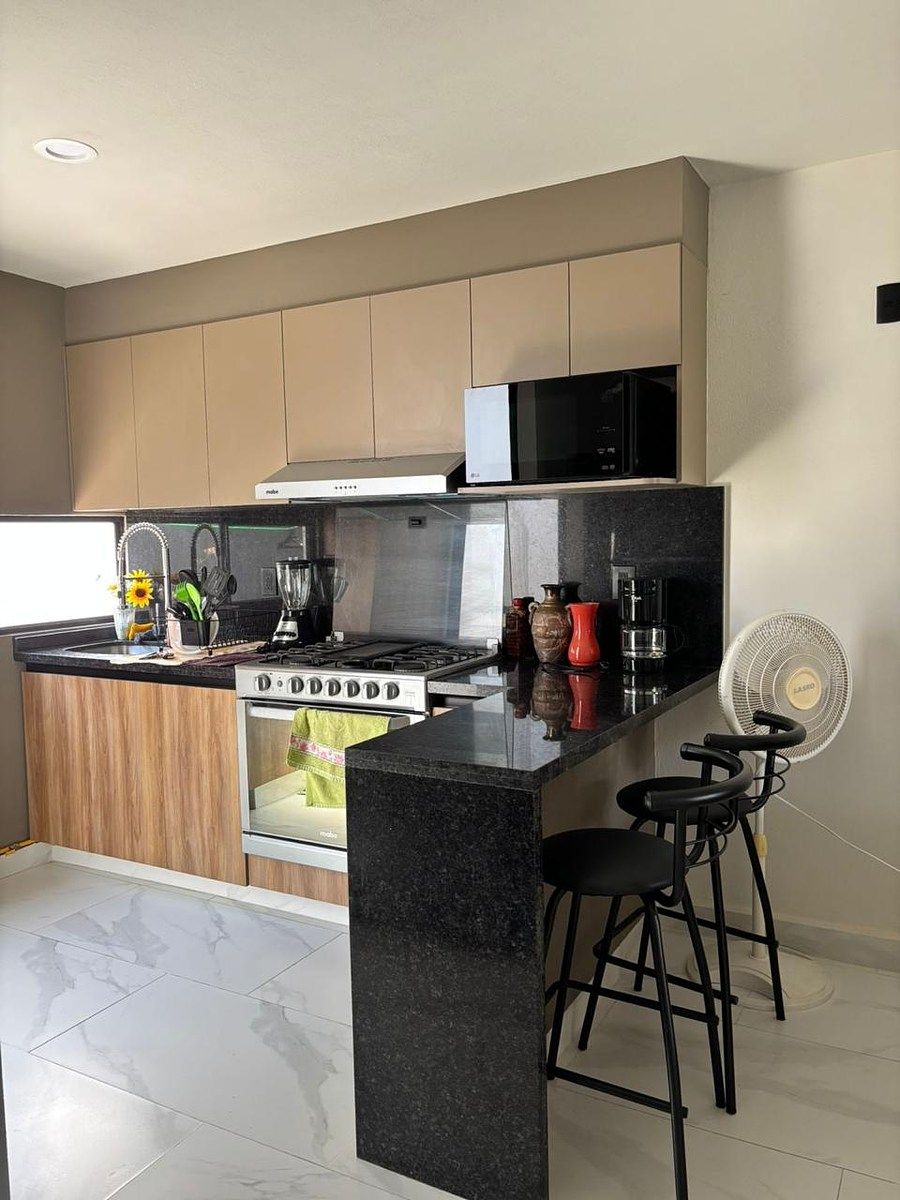 4 de 33: cocina equipada