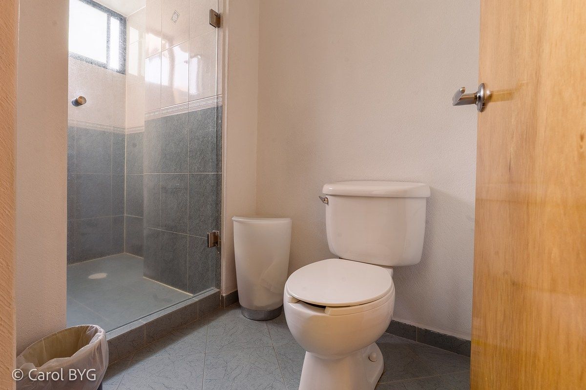 11 de 12: Dos baños con regadera