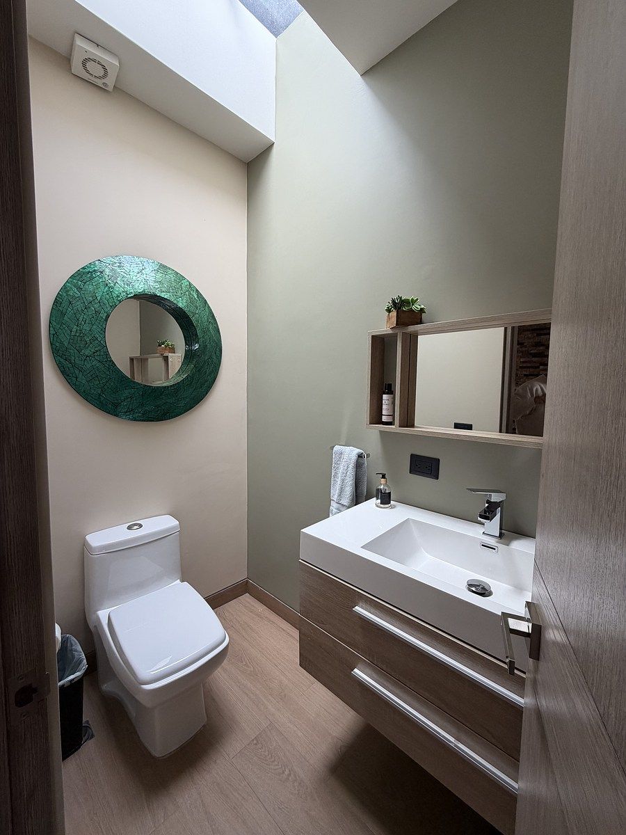 12 de 19: Medio Baño