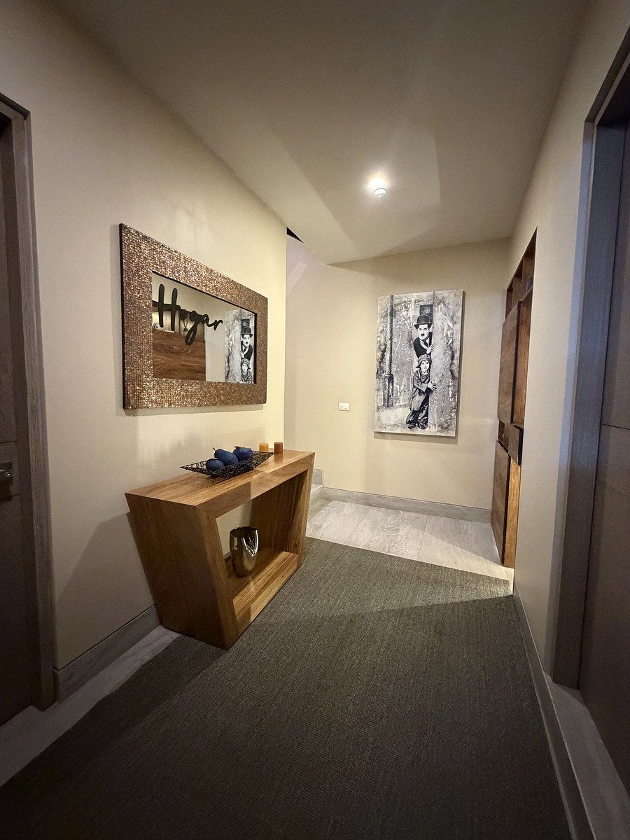 18 de 19: Recibidor del área del estacionamiento