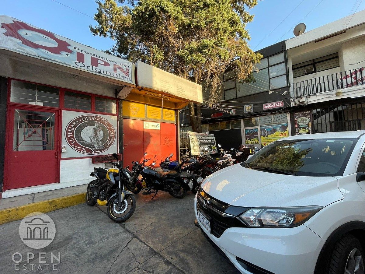 1 de 25: Frente del local.  (naranja izquierda)