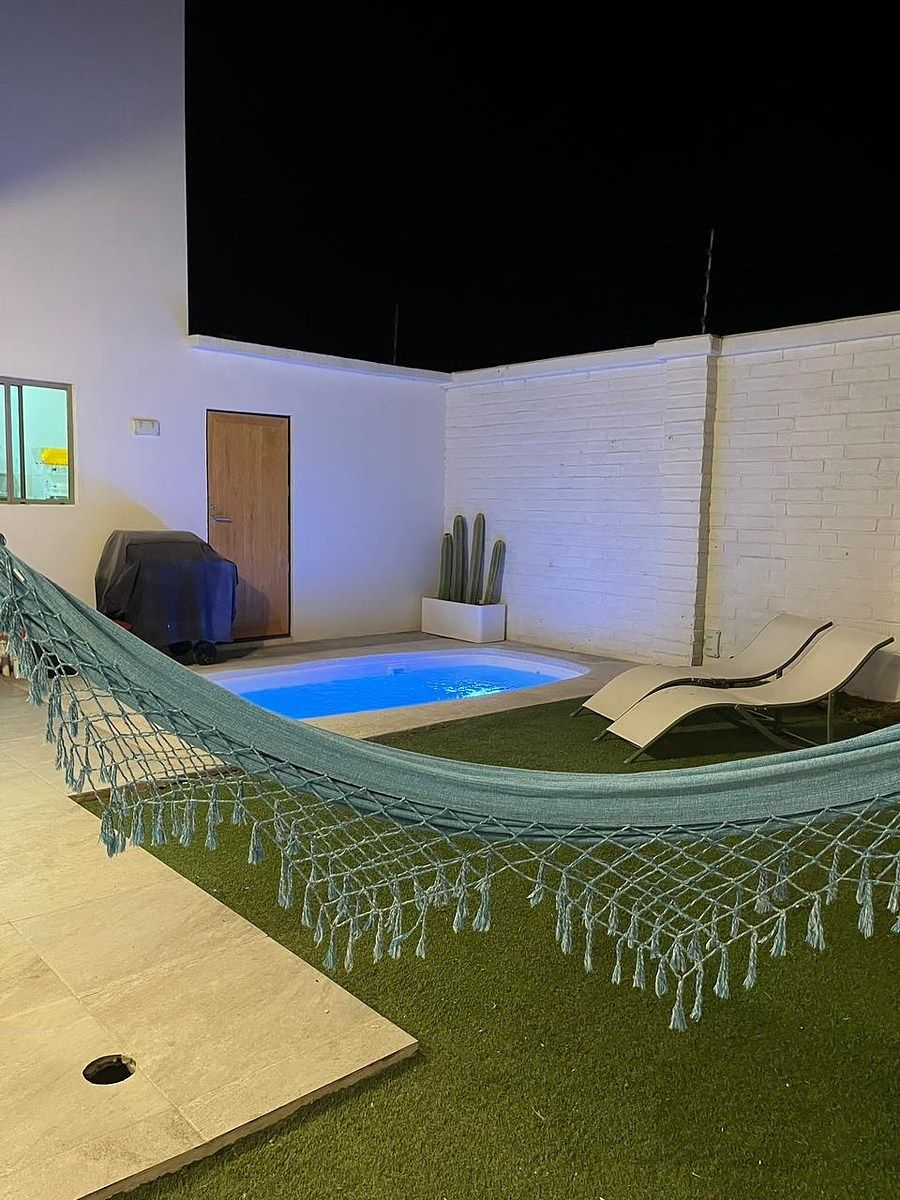 22 of 22: Jardín/alberca