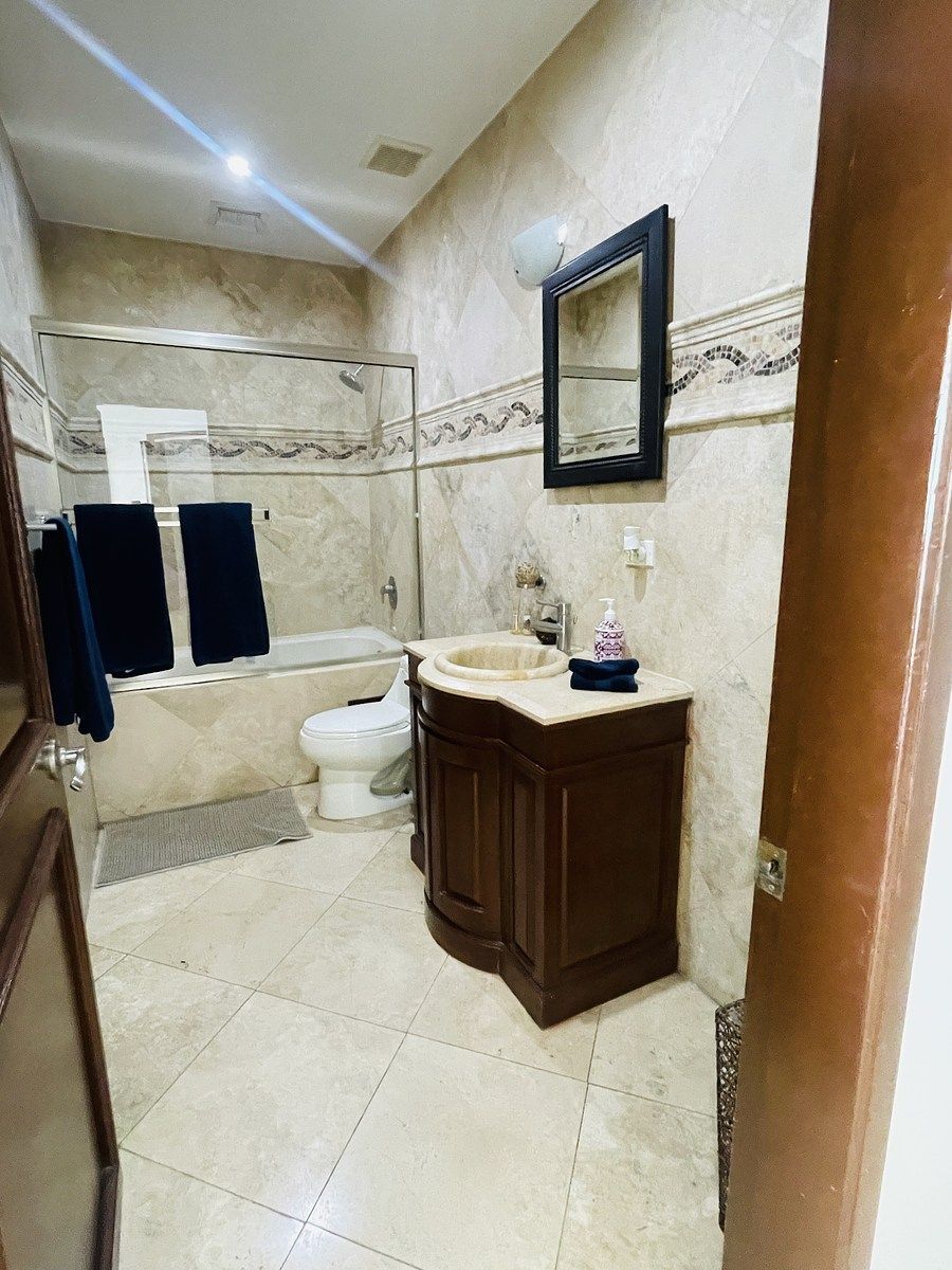 14 de 34: BAÑO COMPARTIDO