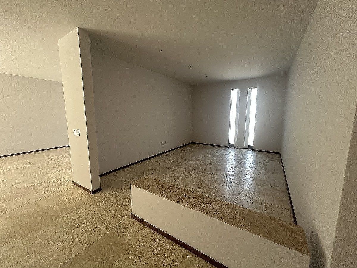 20 de 39: Espacio semi abierto para Living Room