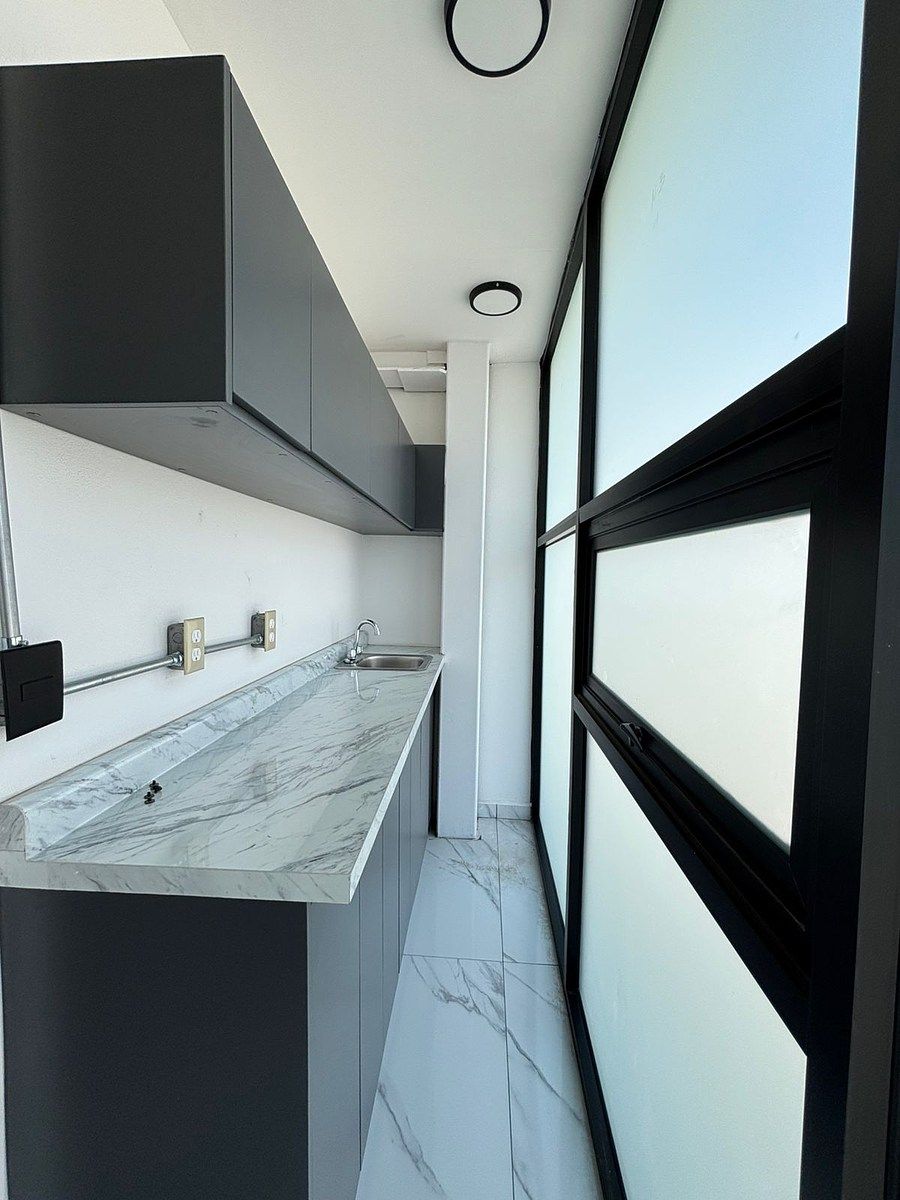 18 de 30: Área de Café dentro de sala de juntas