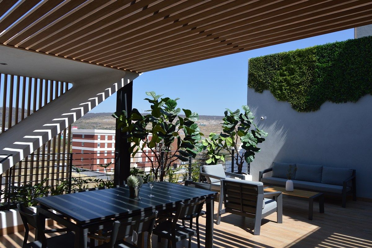 35 de 42: Terraza apergolada en amenidades.