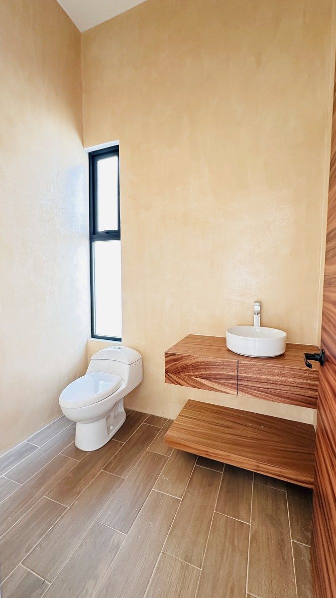 9 of 36: Medio baño con acabados en chukum