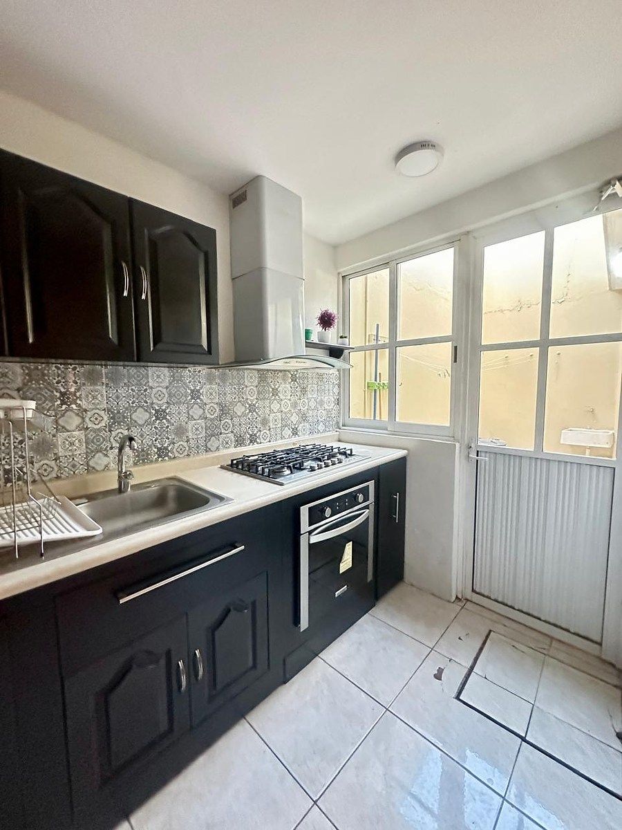 16 de 32: Cocina equipada