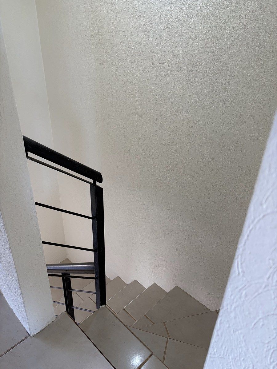 9 de 13: Vista de arriba de la escalera