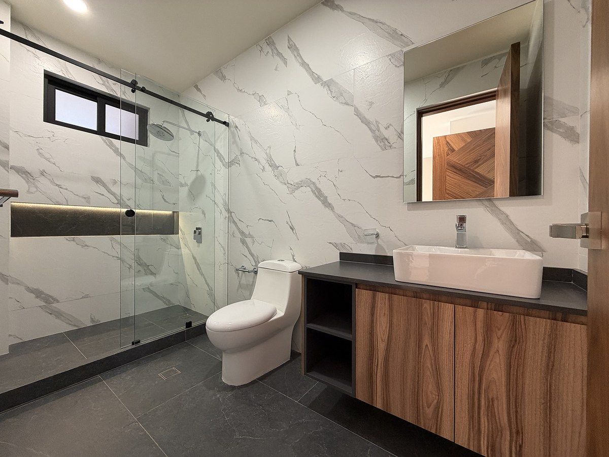 25 de 32: baño habitación secundaria