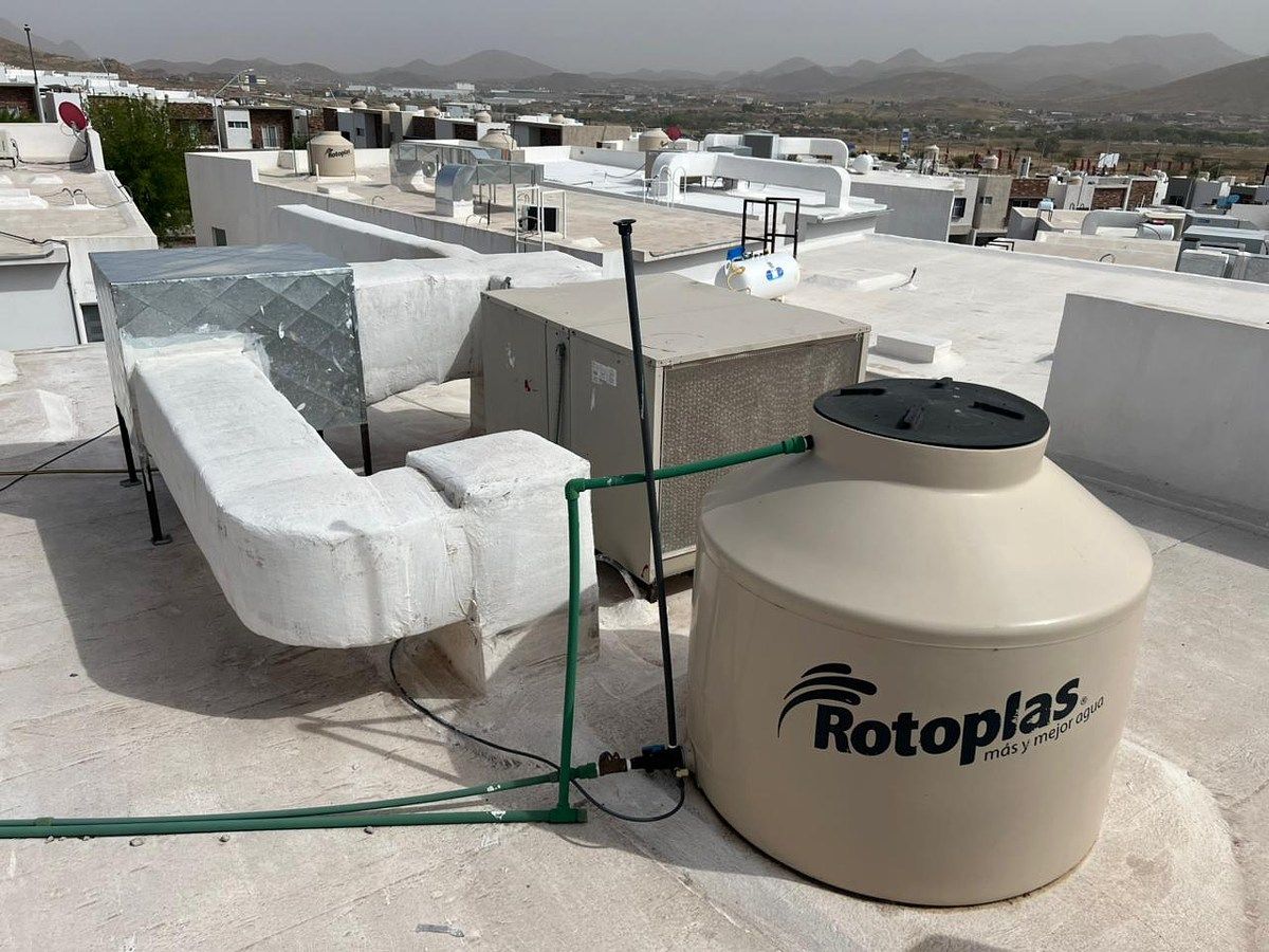 17 de 18: A/C y tinaco