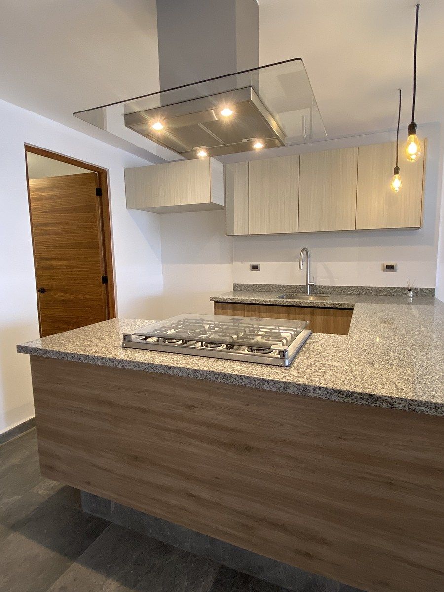 1 of 26: Cocina integral de con barra de granito