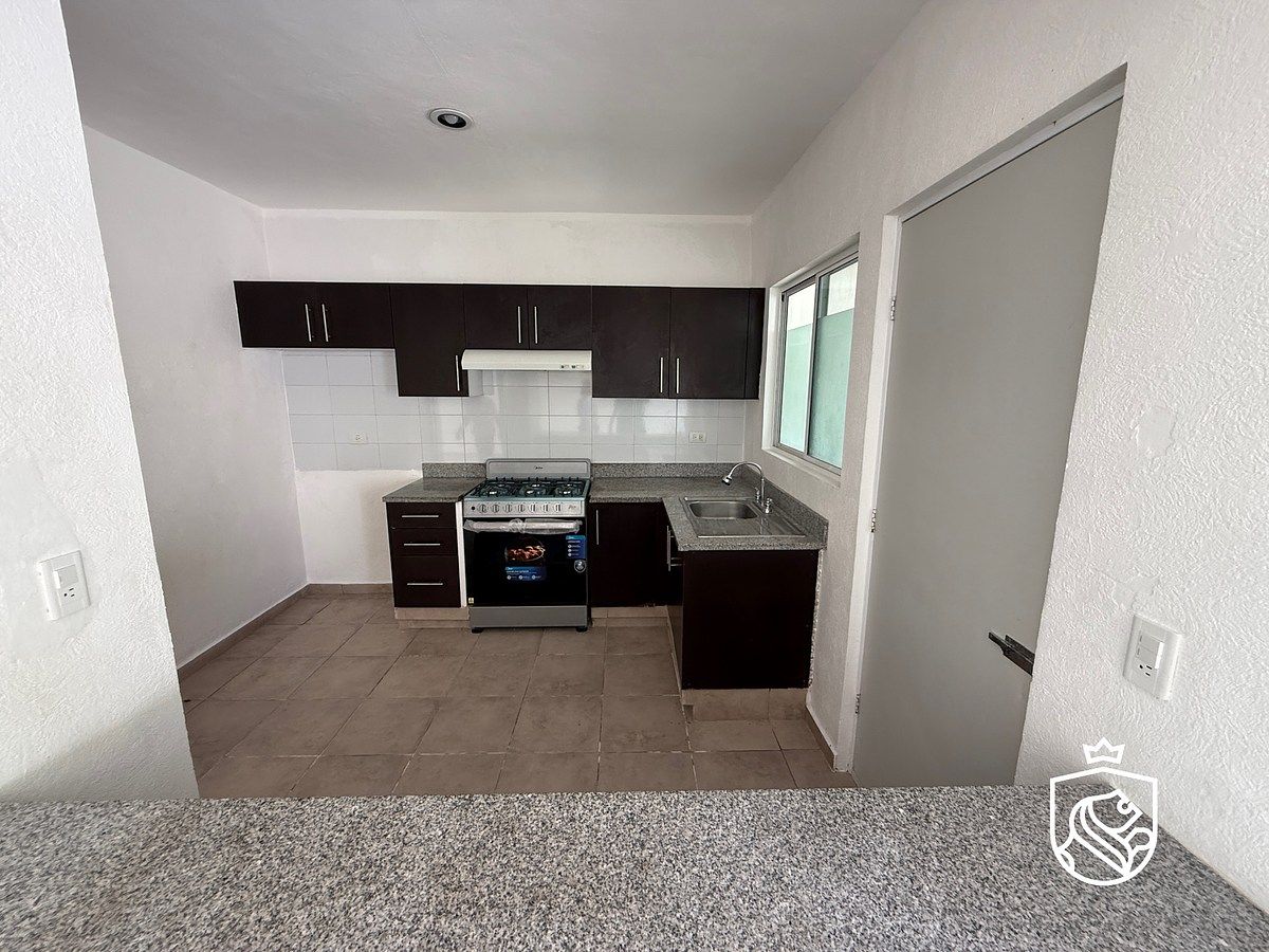 6 de 25: Cocina y desayunador