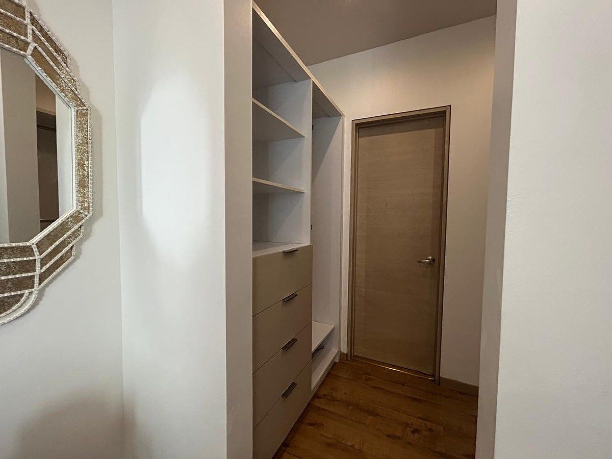 15 of 29: Recámara Secundaria 2 - Walking Closet - Bano