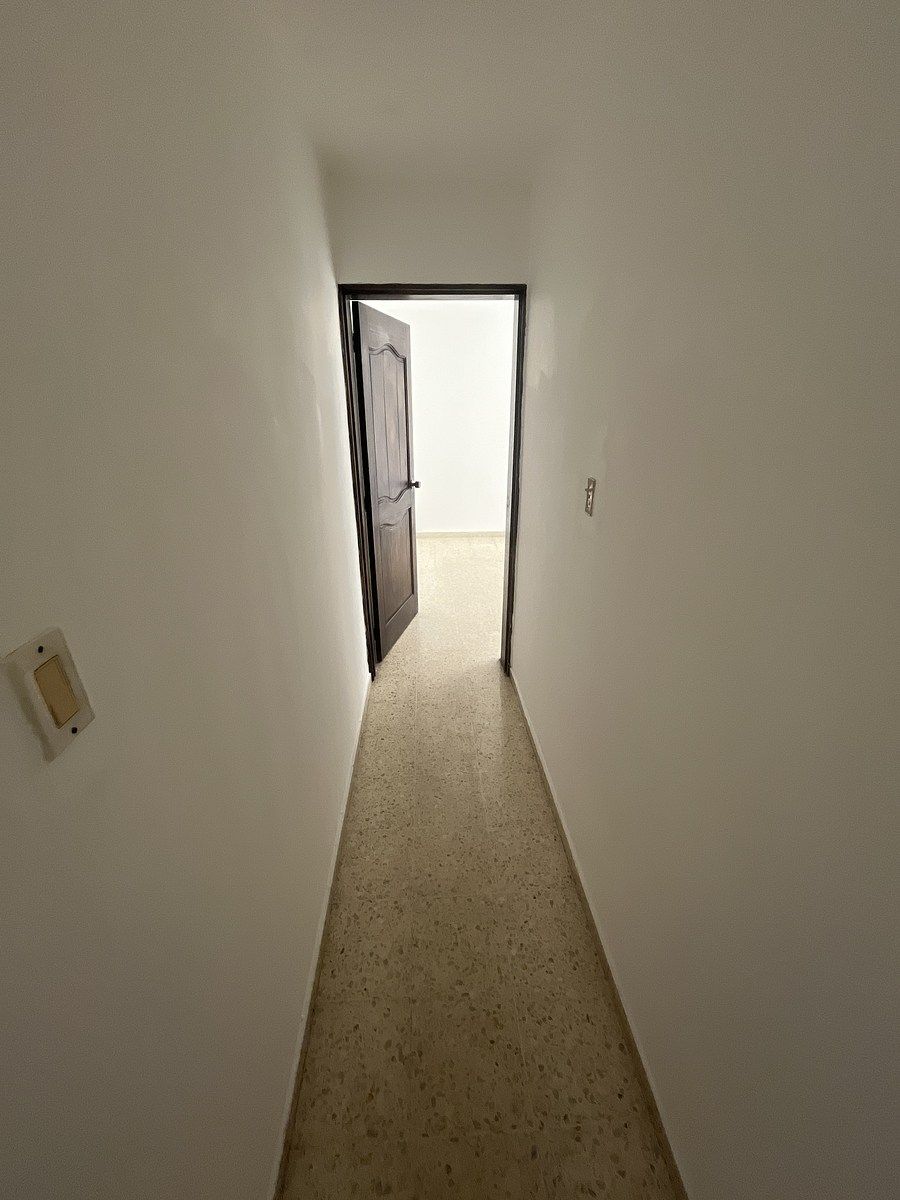 3 de 14: Pasillo a las habitaciones