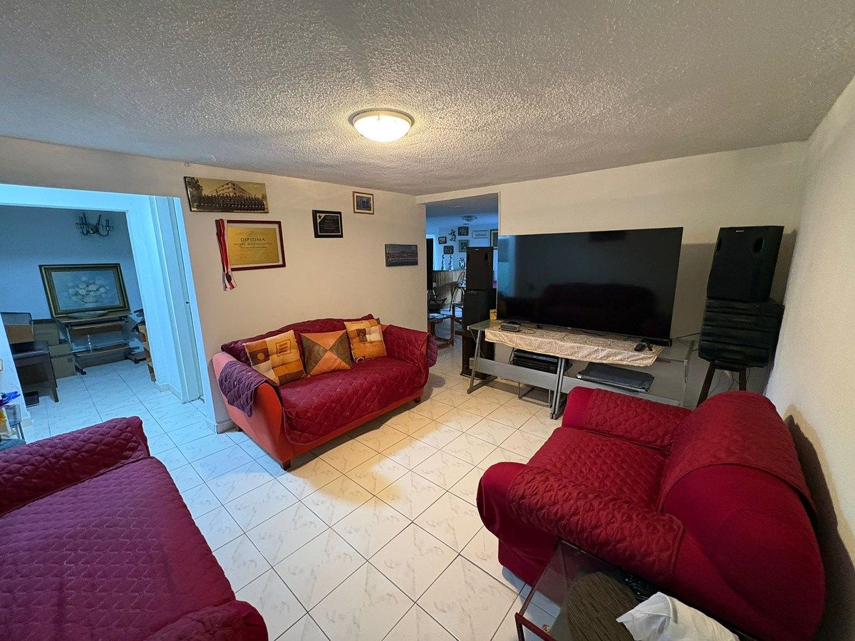 9 de 21: Área de tv family room