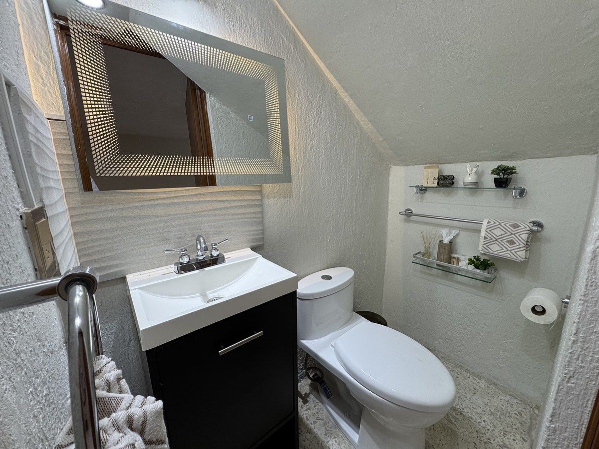 8 de 16: Medio baño