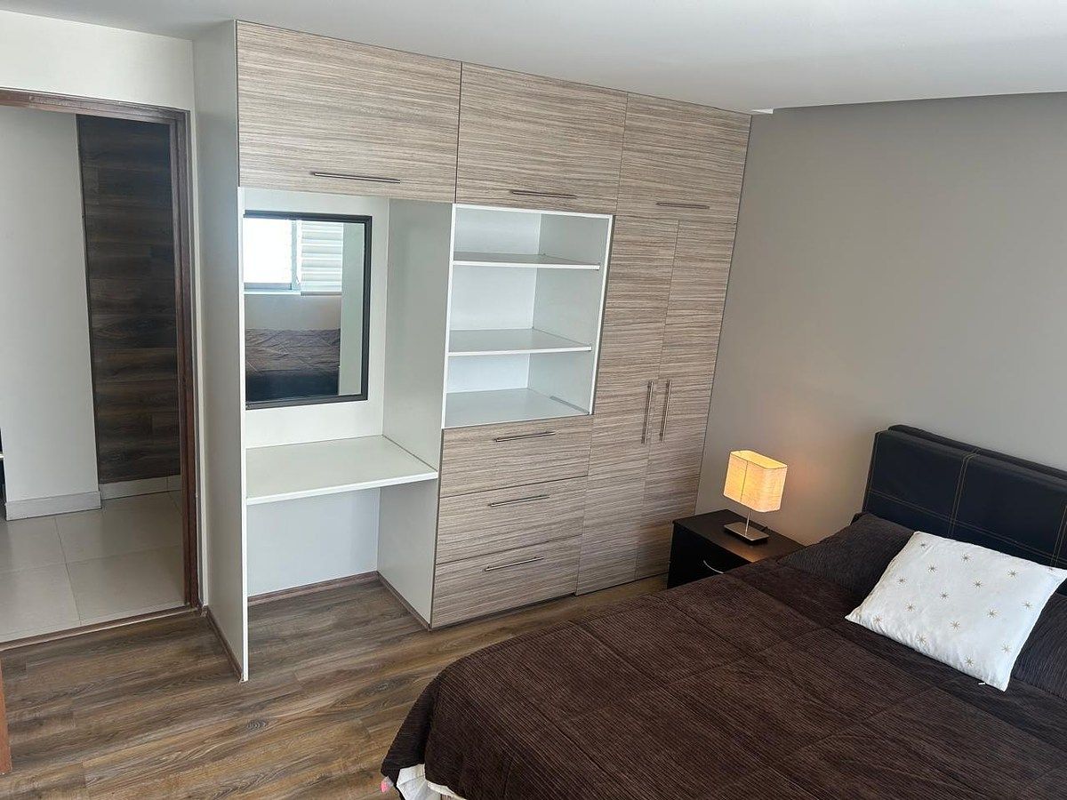 15 de 18: Recámara 2. Clóset y tocador