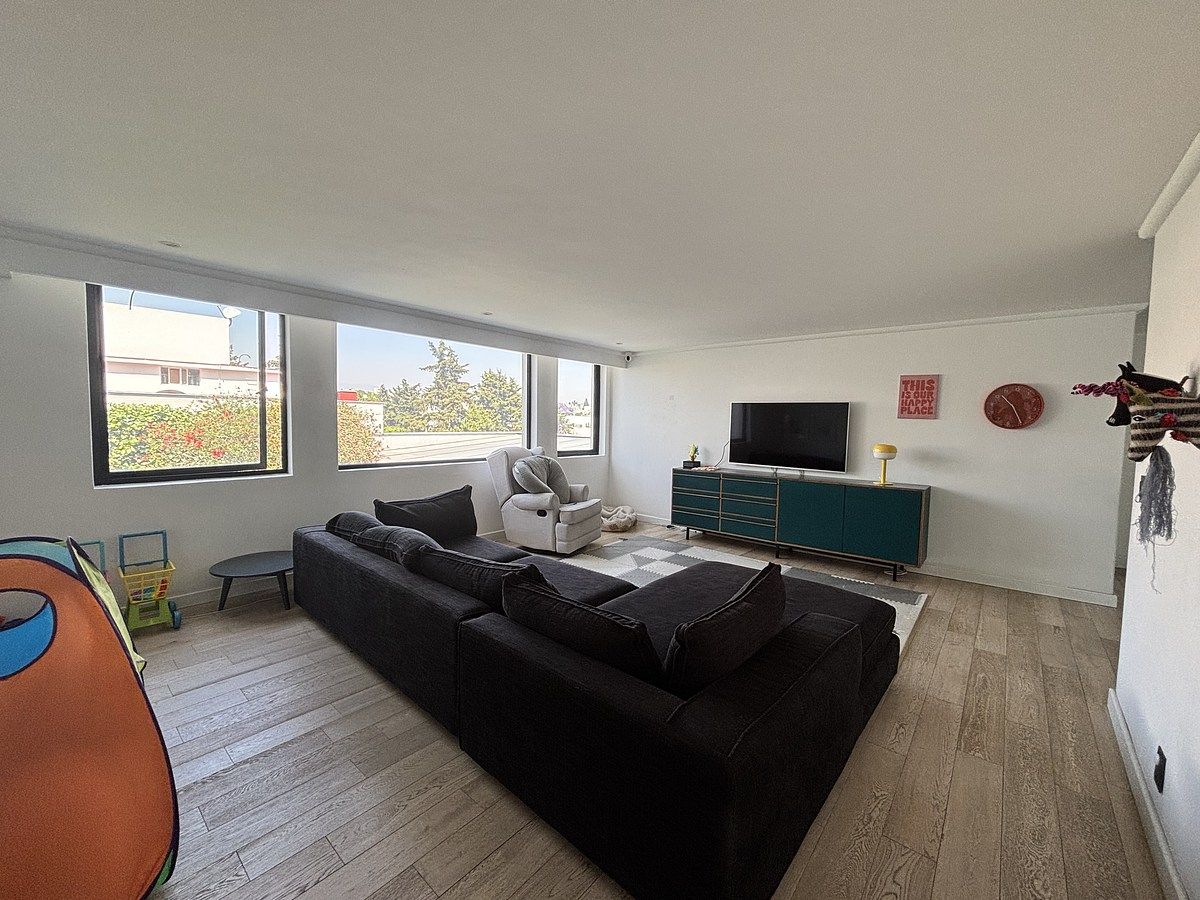 23 de 27: Cuarto de TV