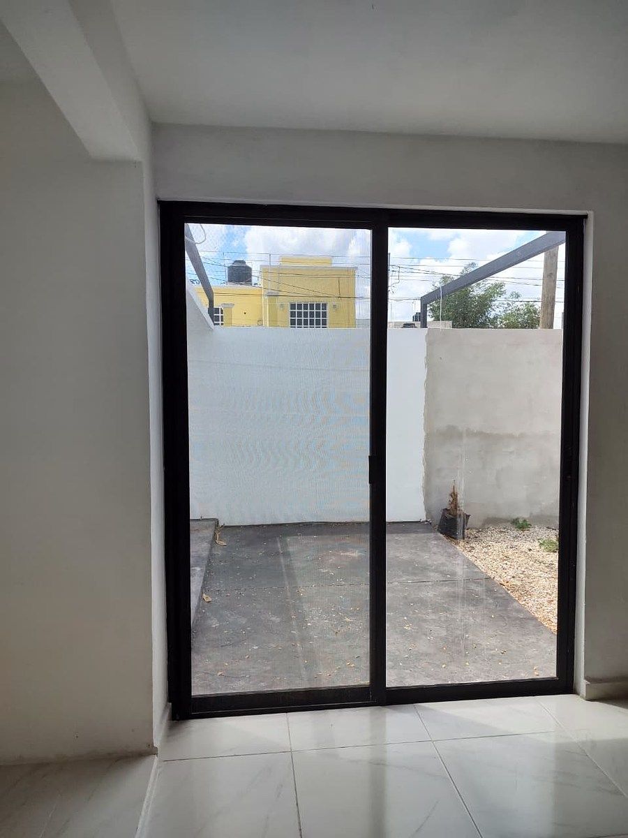 9 de 18: puerta de cristal en cocina