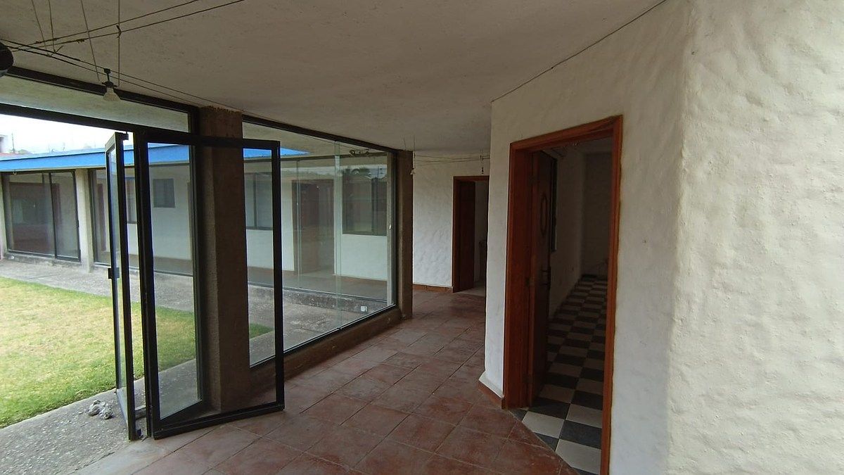 6 of 40: Recamaras ubicadas a mano izquierda de la entrada a la casa.