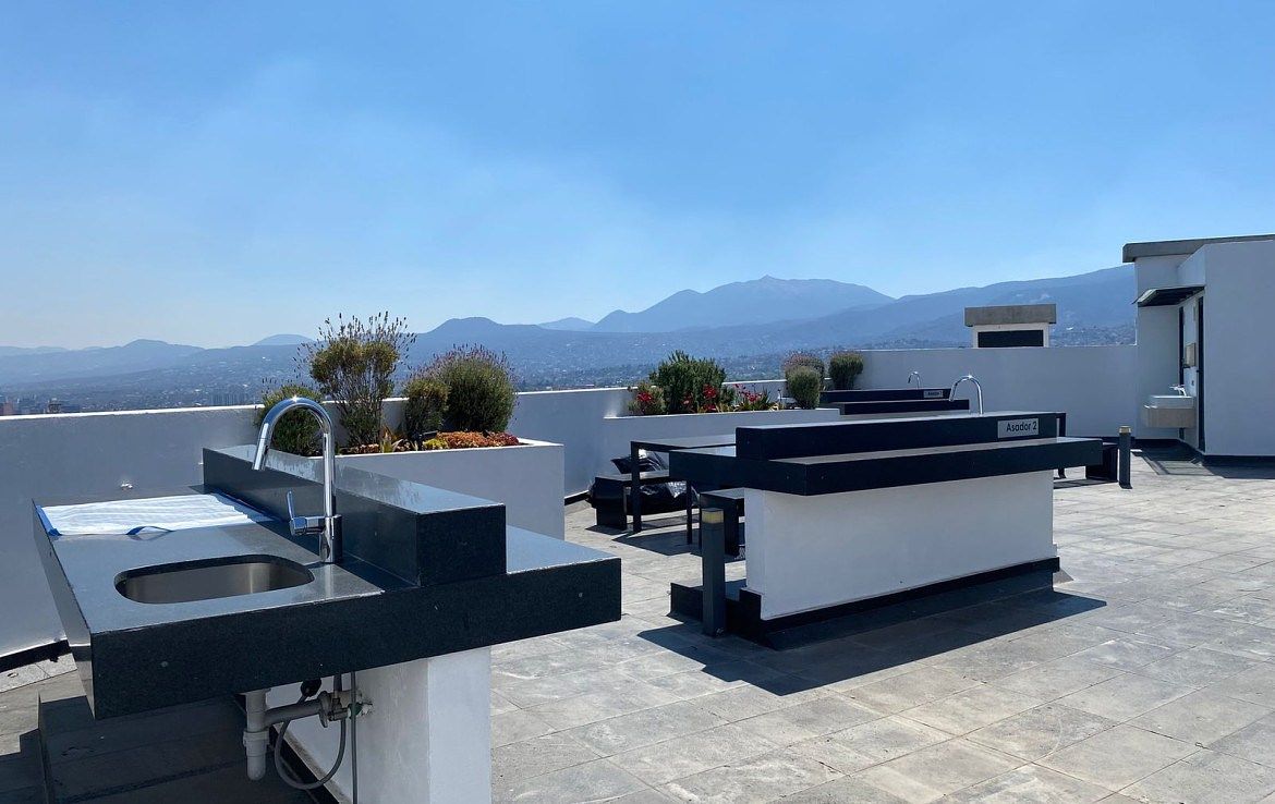 18 de 22: Roof Garden con Asadores y Baños