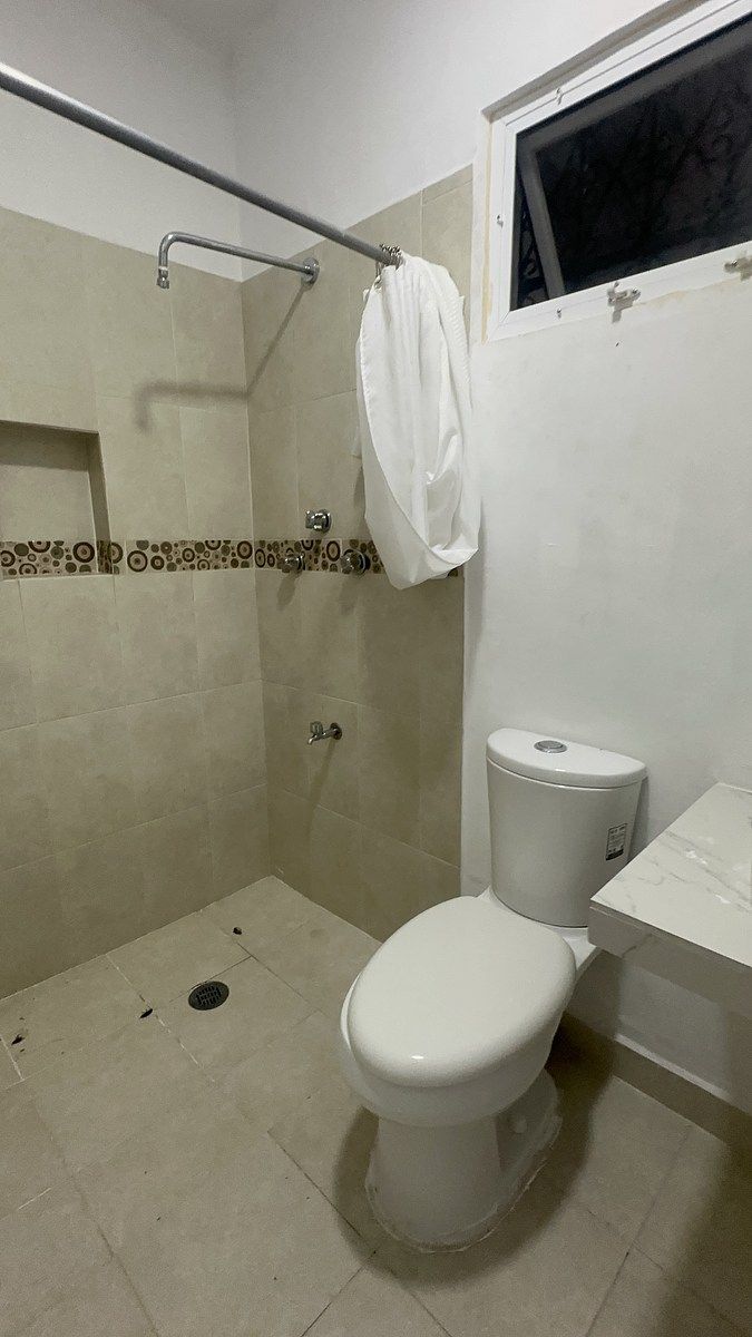 17 de 21: Baño compartido