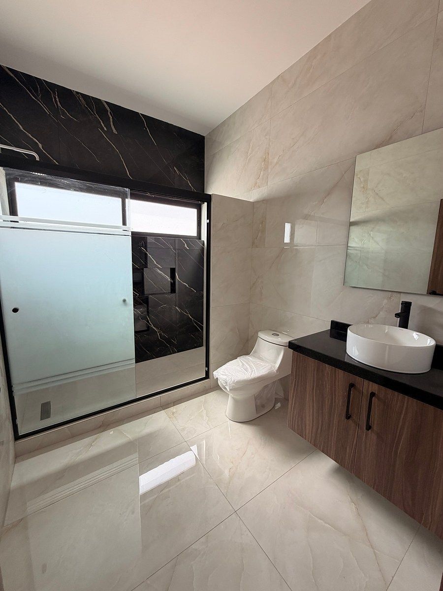 9 de 13: Baño compartido