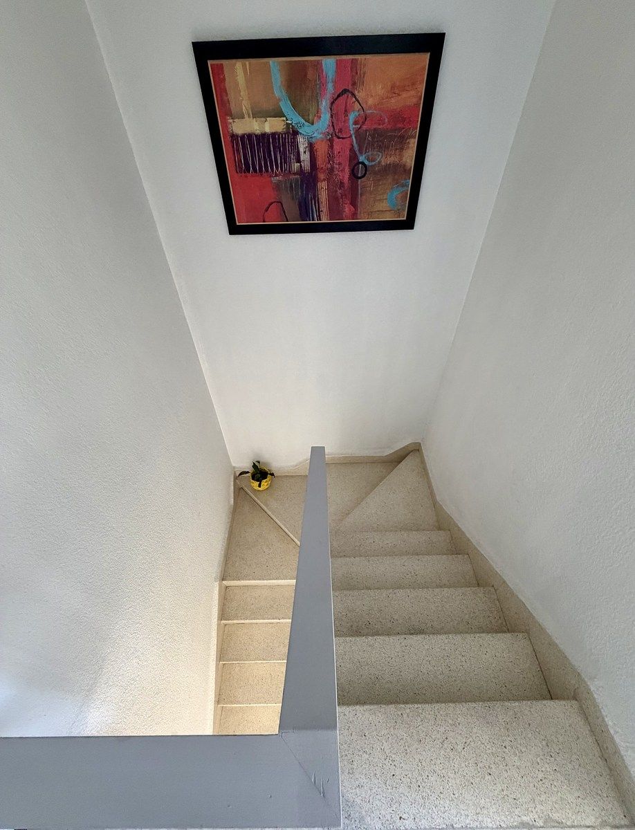 12 de 20: Escaleras para acceder a la primera planta