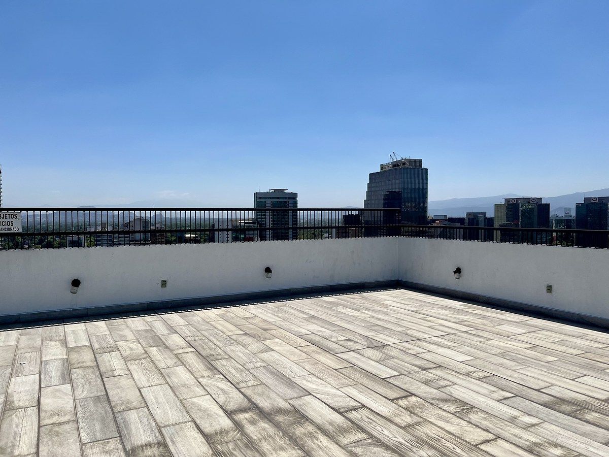 26 de 28: Terraza con asadores