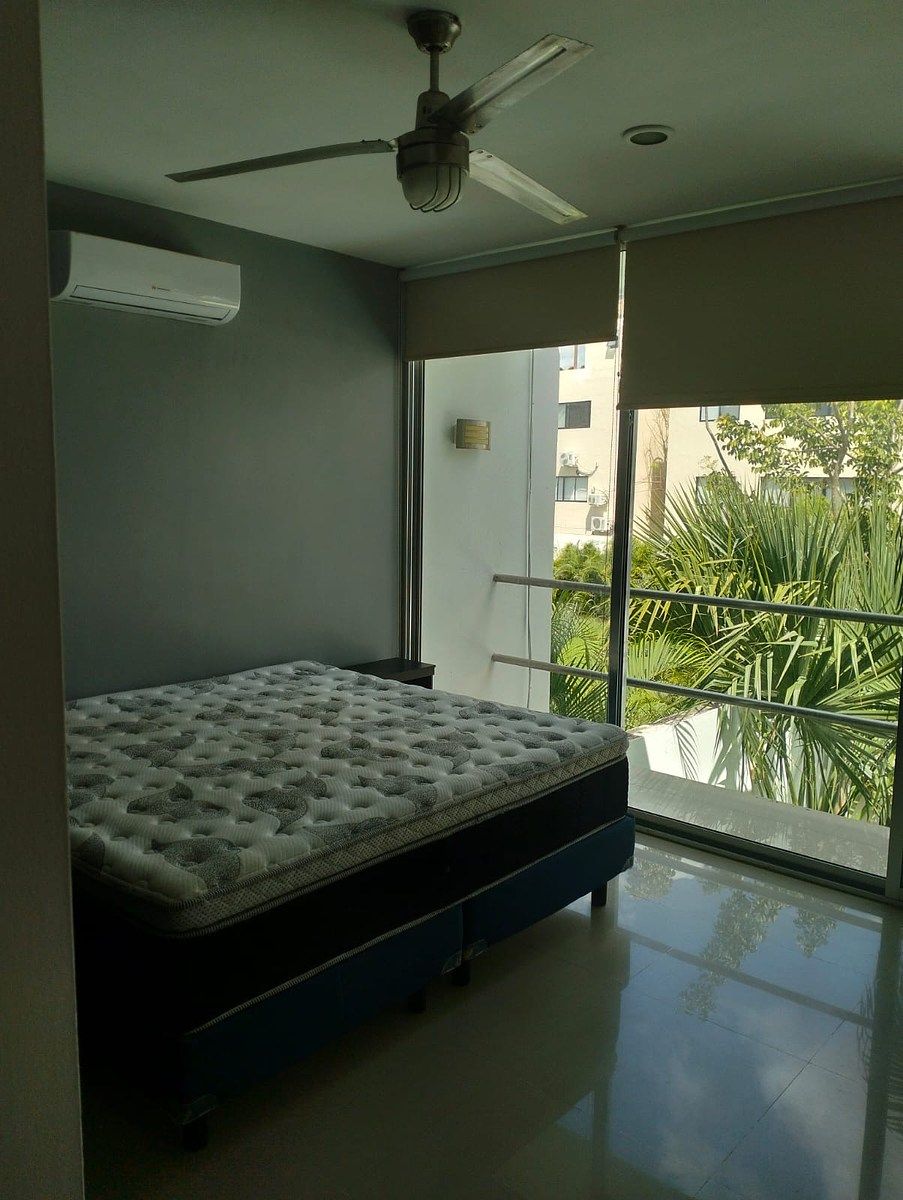 8 de 15: Habitación con vista a la alberca y área de relajación