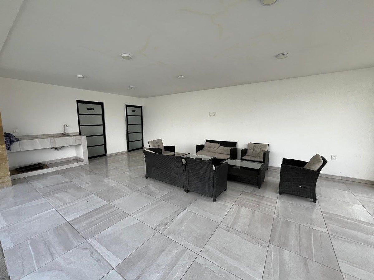 16 de 21: Área común.