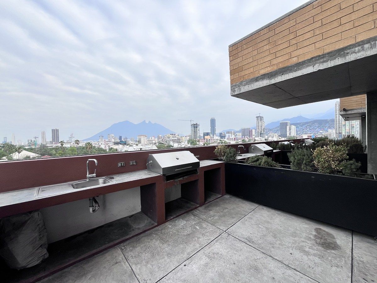 9 de 13: Área de Asadores