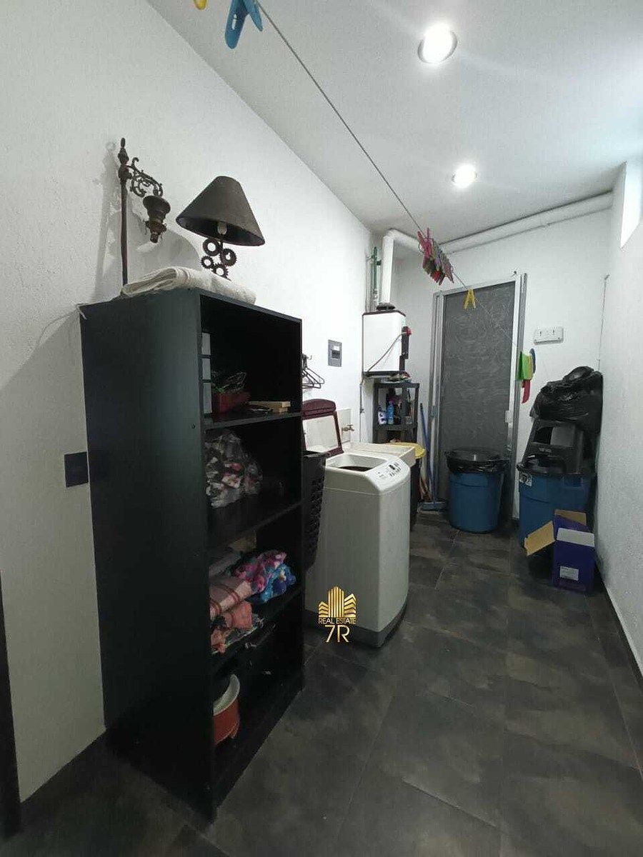 37 de 37: área de lavado a nivel cochera