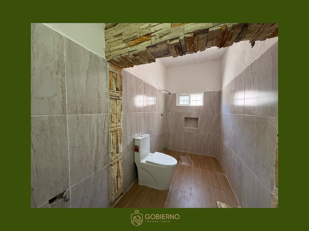 3 of 11: Baño compartido