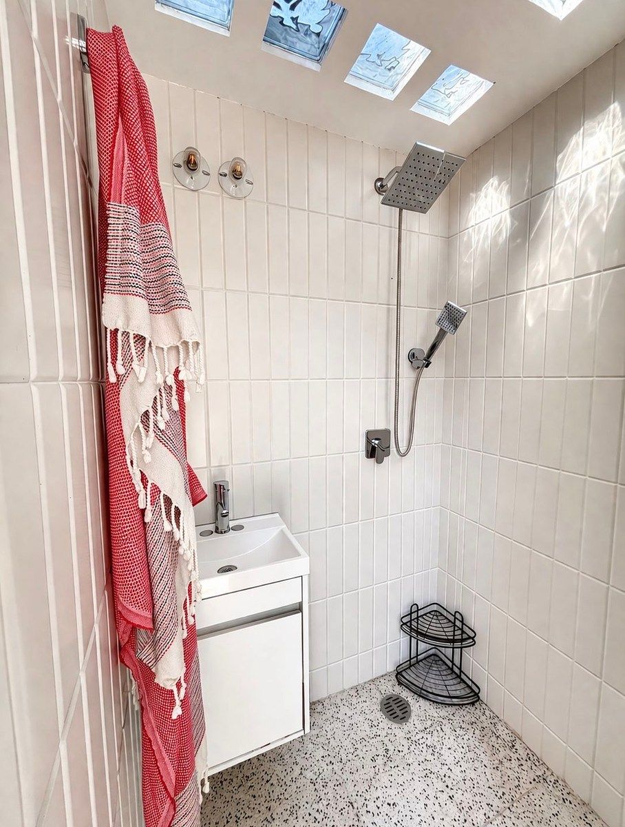 36 de 44: Baño de estudio en Roof Garden