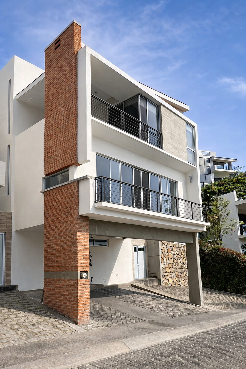 3 of 9: Fachada lateral dentro de coto Vista Cañadas