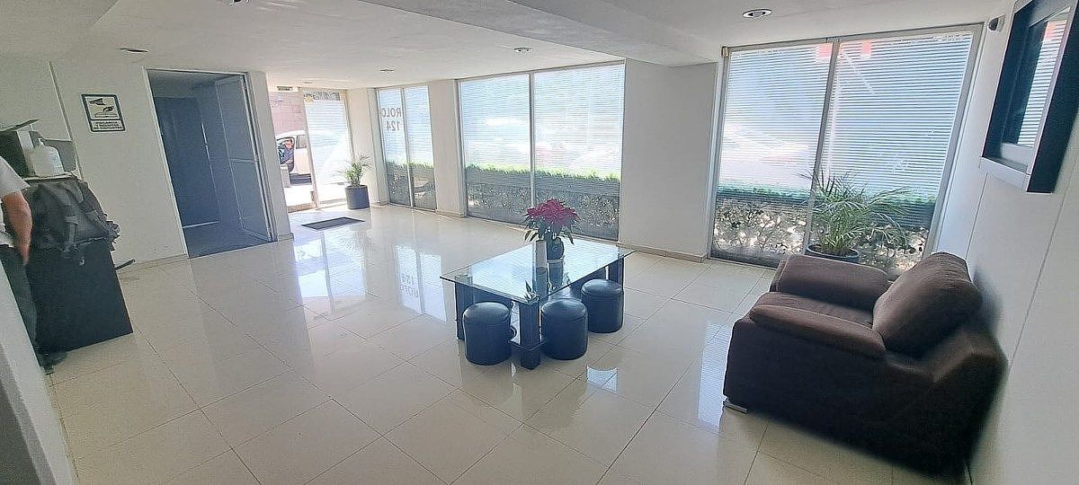 27 de 28: Lobby del Desarrollo-Ingreso al Edificio