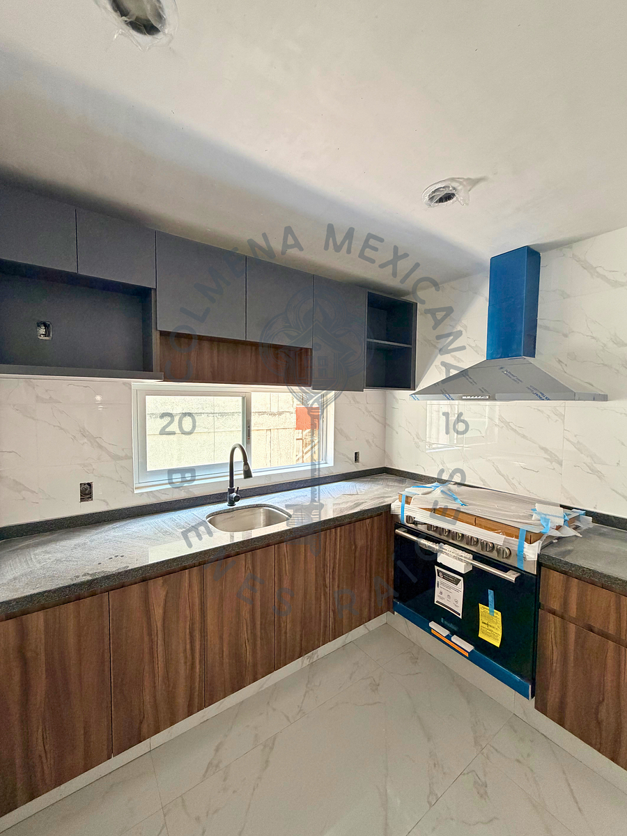 2 de 9: Cocina de granito y ventilación natural