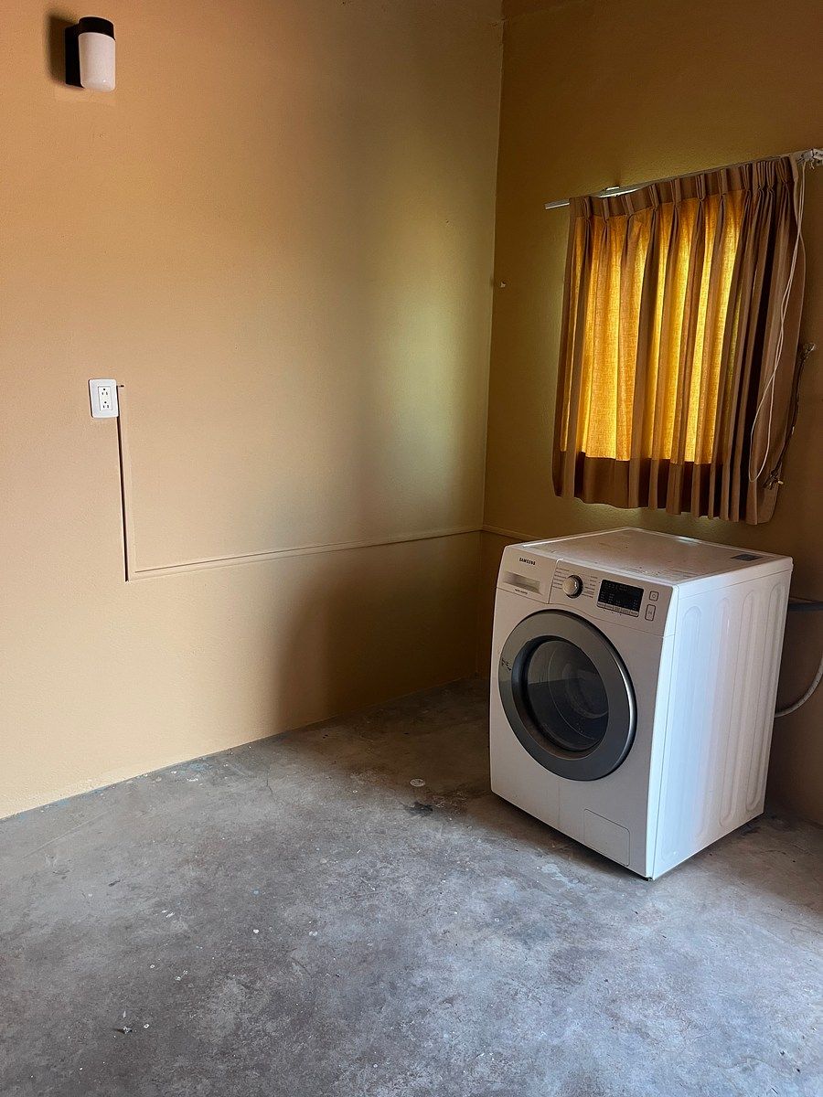 16 de 17: Área de lavado con lavadora