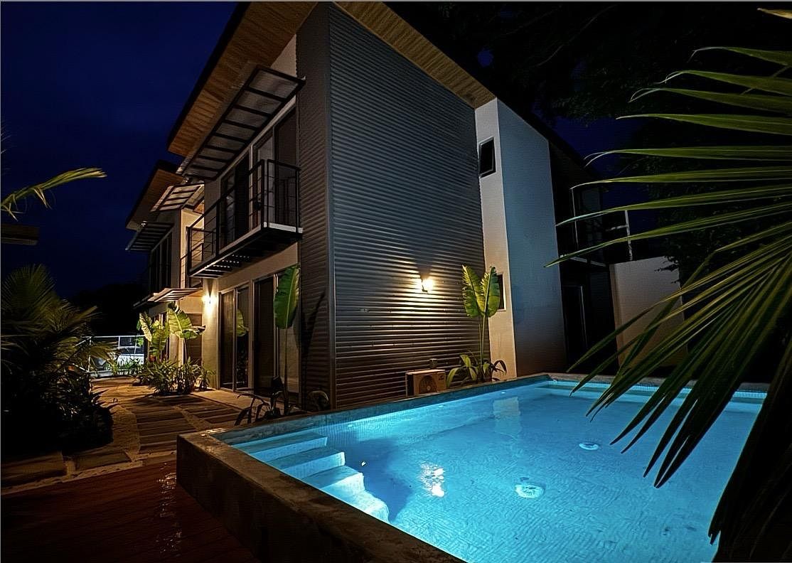 Night view of pool, photo 16 of 18