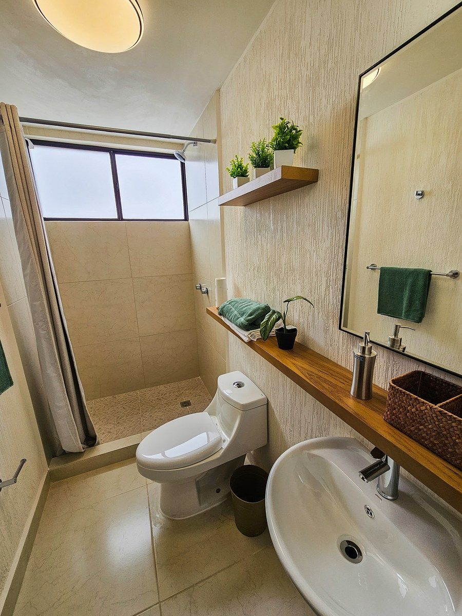 18 de 21: Baño completo