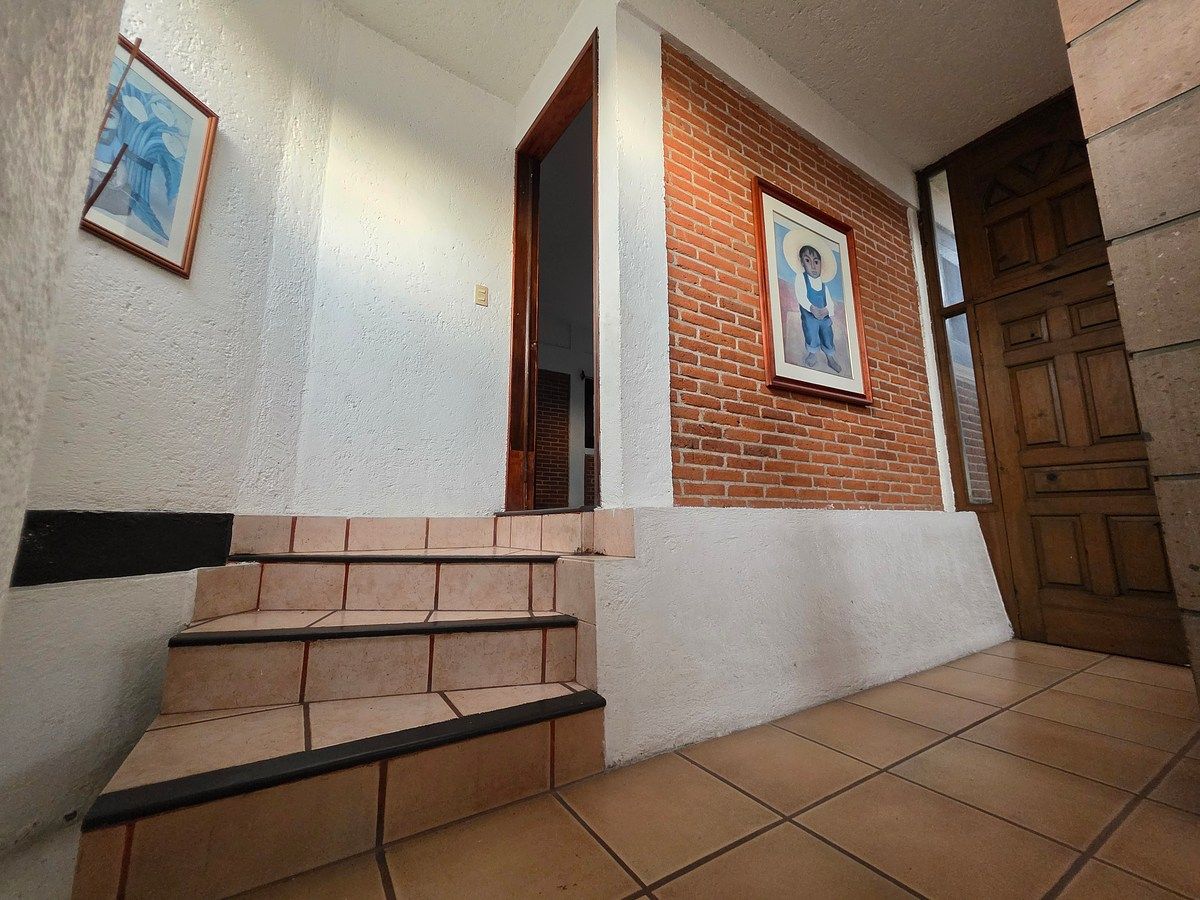 18 de 40: Acceso a la habitación principal.