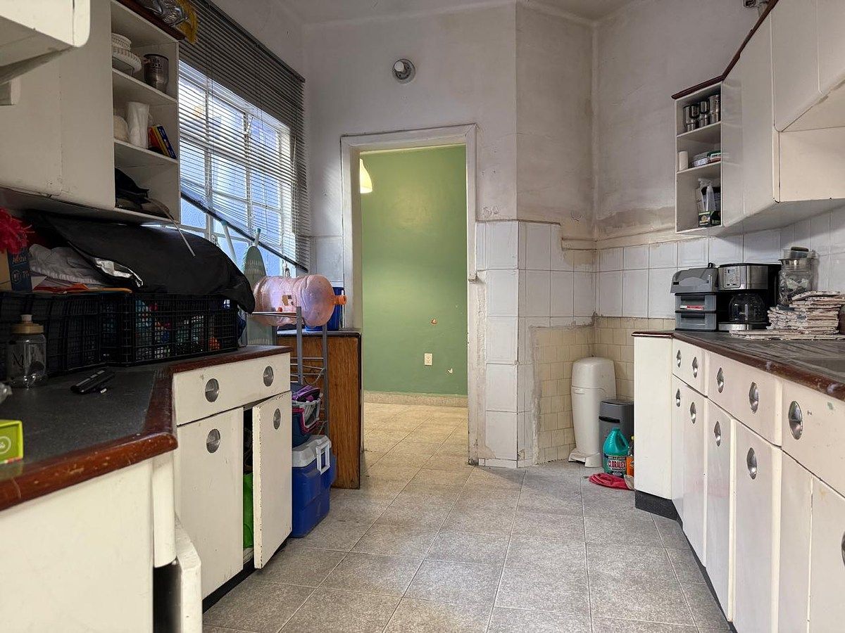 11 of 23: Cocina Planta Baja