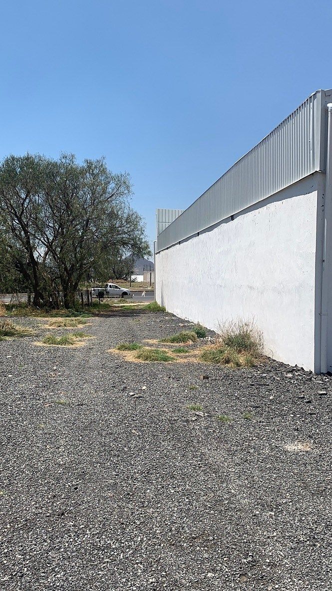 6 de 7: Acceso a terreno trasero