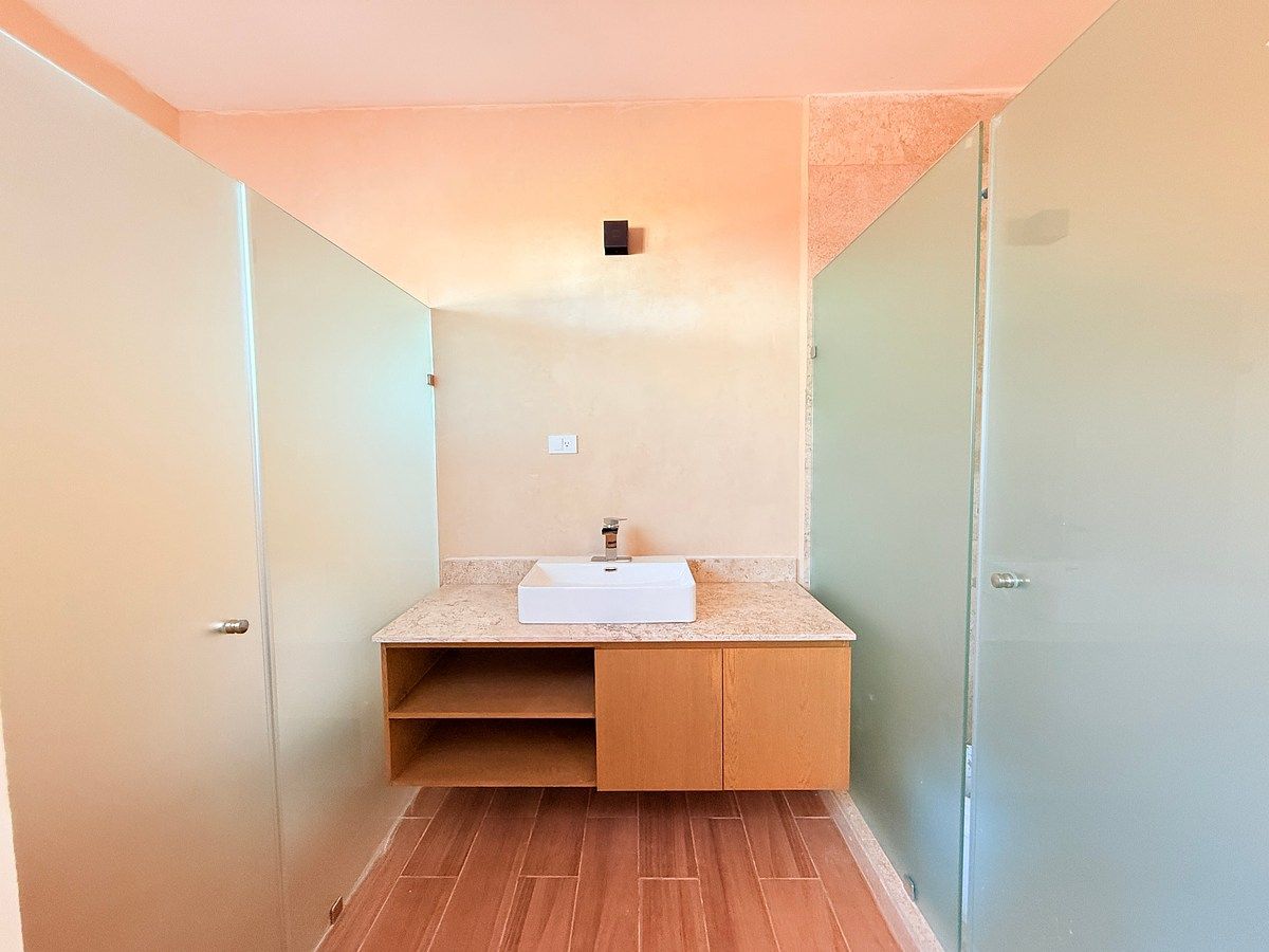 7 de 10: Baño Compartido