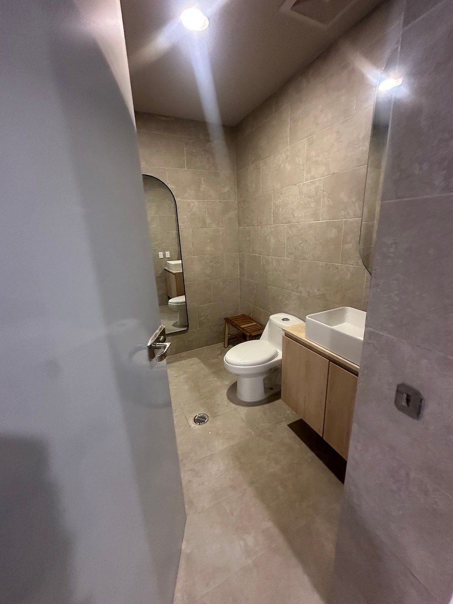 23 de 26: Baños área comun